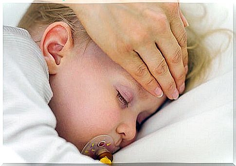 A forehead compress is one of the home remedies for lowering a fever.