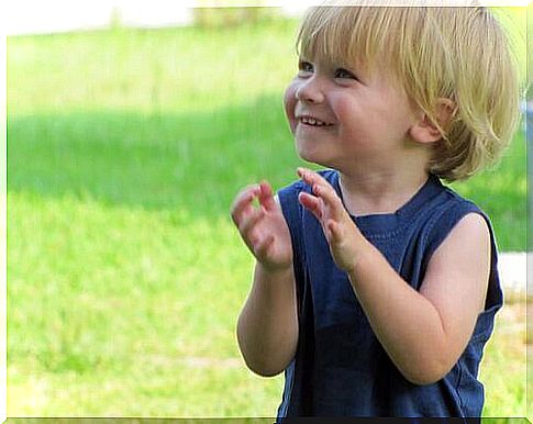 Happy child with blue shirt.