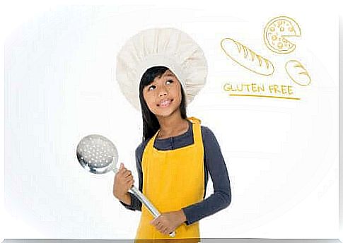 little girl dressed as a cook with celiac disease