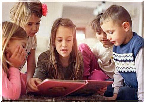 improving attention and concentration is definitely important in a world that is increasingly rich in stimuli.  Children reading a book.