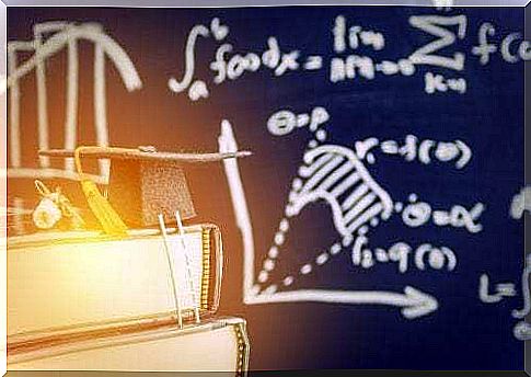 Blackboard with formulas and books