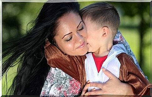 Mom and son hugging each other