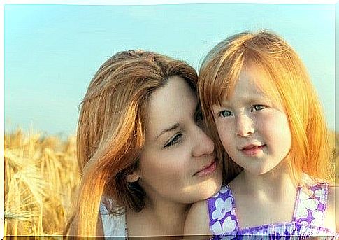 Mom and daughter with blond hair.