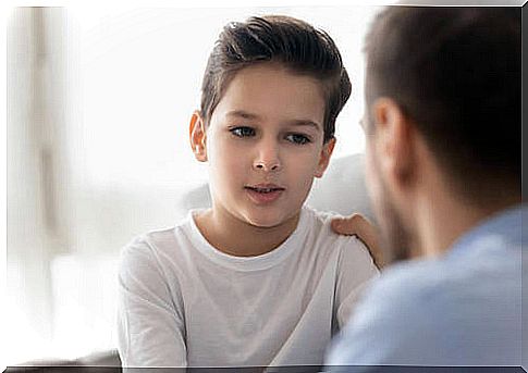 Father having a conversation with his son.