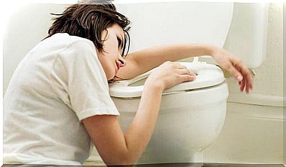 Pregnant woman vomiting