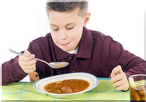 Child eating lentils