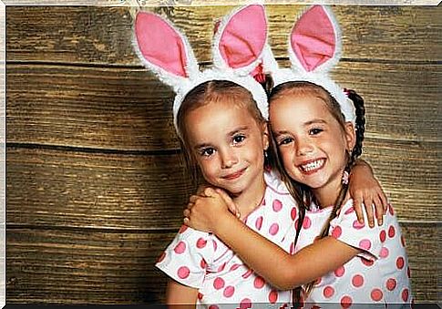 Twin sisters with bunny ears