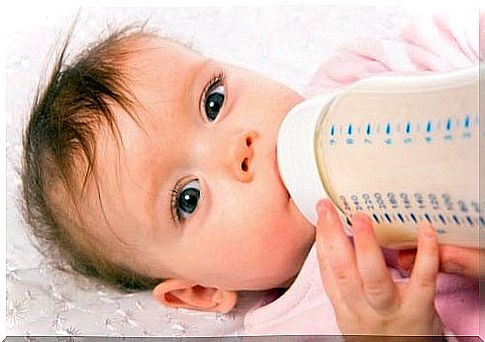 Baby drinking from a bottle